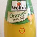 Schwarzes "Stück" im Orangensaft