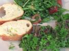 Kräuterlamm mit Rucola-Tomatensalat