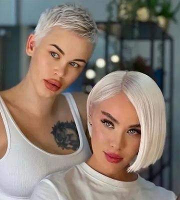 - (Attraktivität, kurze Haare)