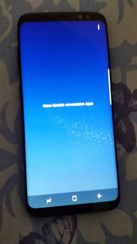 Beim Samsung Galaxy S8 ist im Bildschirm immer eine blasse Grafik leicht sichtbar. Kann man dieses per Software beseitigen oder ist es ein Garantiefall?