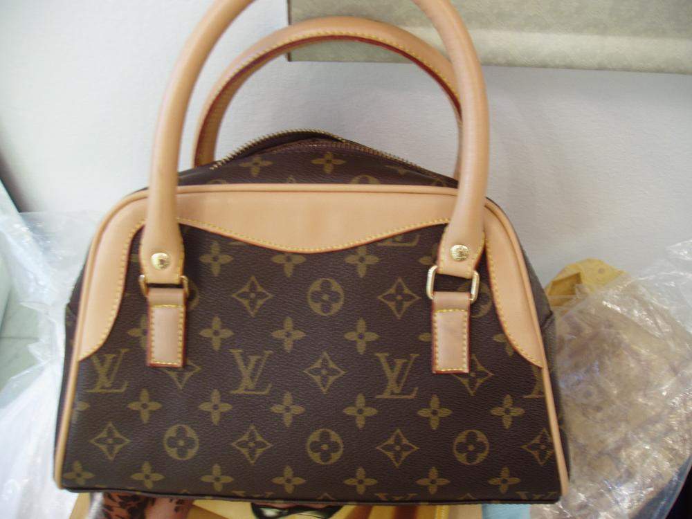 Réplica de viaje de Louis Vuitton a la venta, falsa en línea