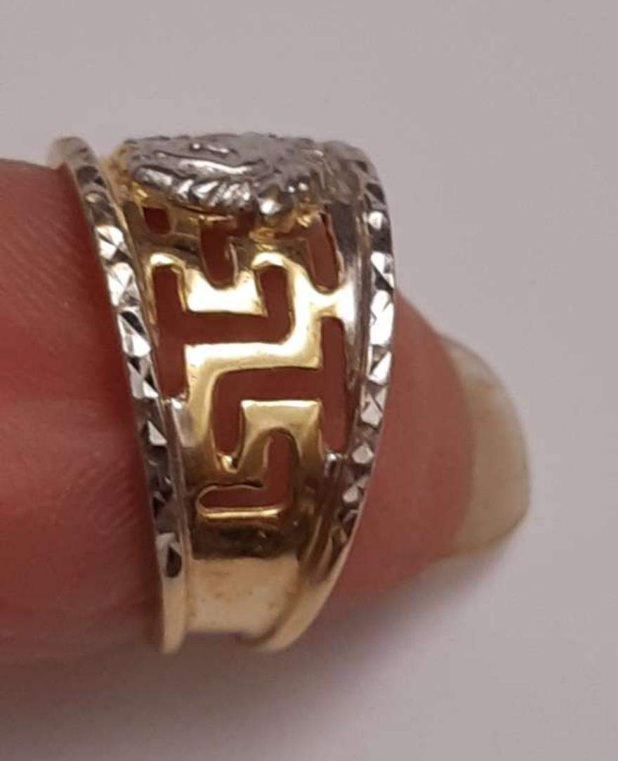 Versace on sale ring fake