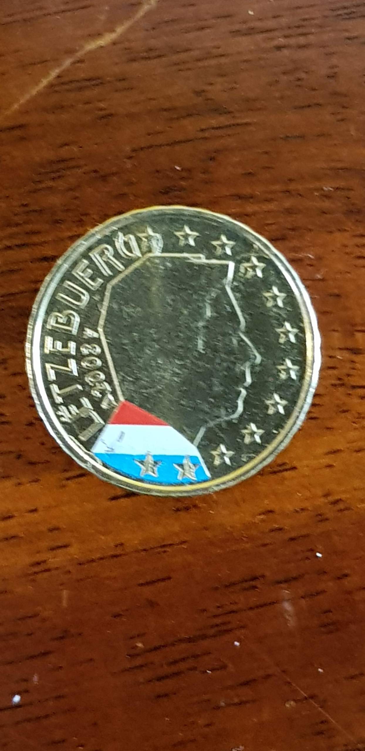 Farbige 10€cent Münze? (Wert, Euro, Münzen) Farbige 10€cent Münze? (Wert, Euro, Münzen)