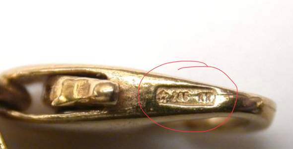 Goldstempel „*285AK“ auf einem 750-er Goldarmband. Was bedeutet das?