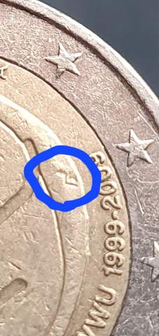 Ist das ein Fehler auf der Strichmännchen münze?