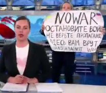 russisch: was stand GENAU auf dem Plakat im Staats-TV?