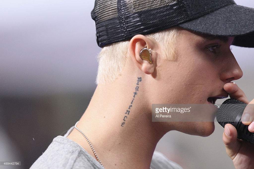 Mann hals tattoo Justinbieber