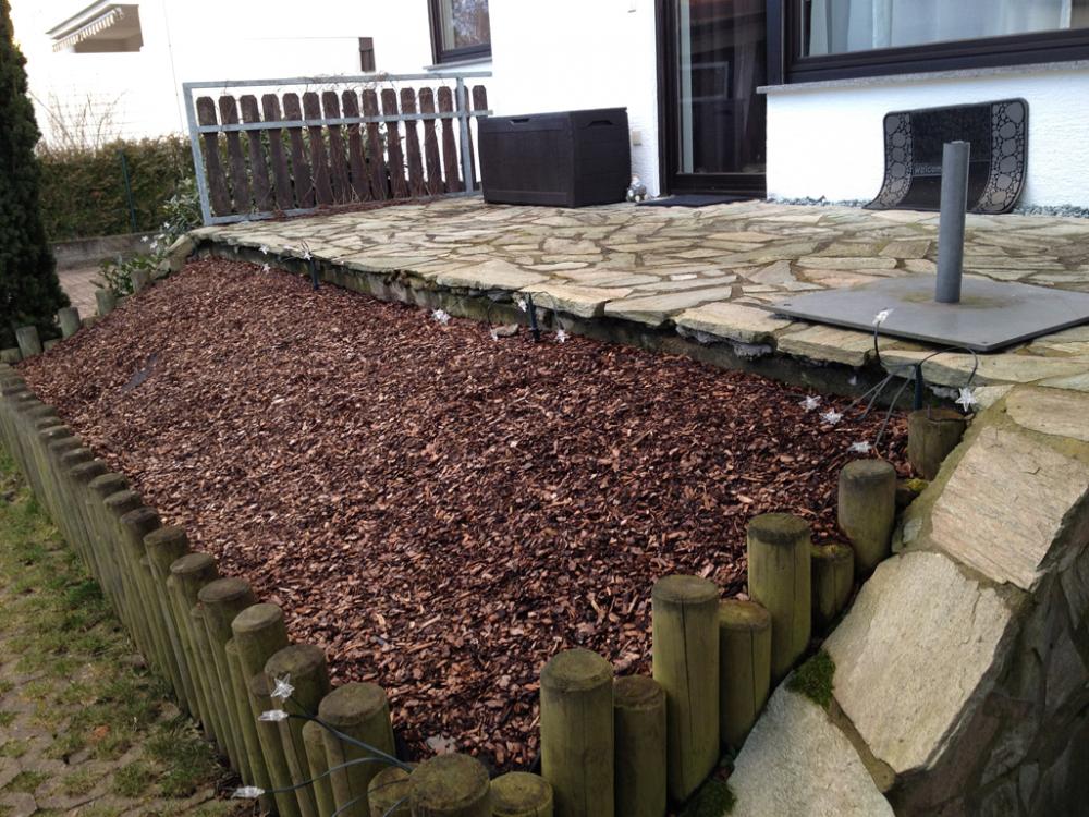 vorhandener Terrasse zu großer Holzterrasse erweitern