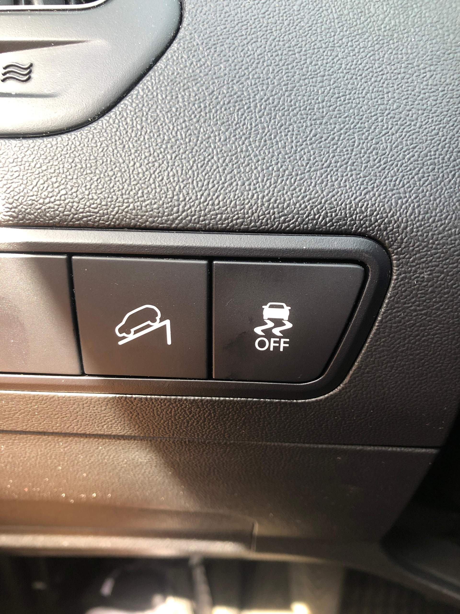 Was bedeutet dieser Knopf im Auto ?