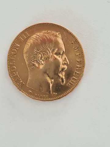 Was ist diese Münze wert und welches Material?