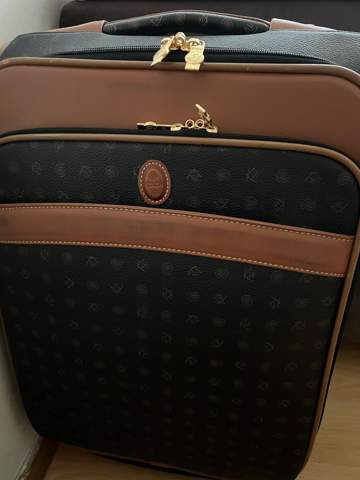 Was ist Ihre Meinung über meinen hässlichen Koffer?
