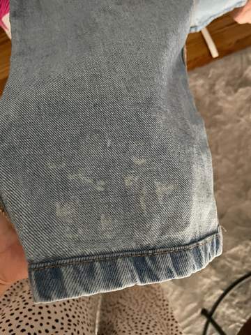 Was sind das für Flecken in Jeans nach dem Waschen?