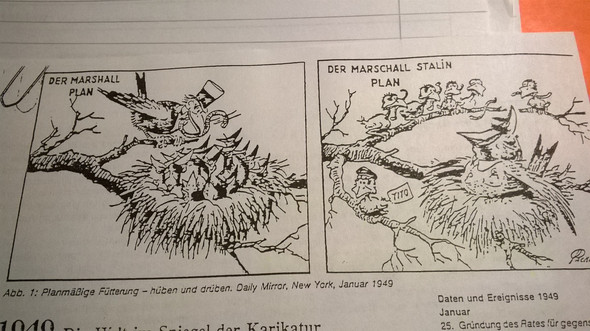 was soll diese Karikatur bedeuten? was soll sie symbolisieren? warum "füttern" die kleinen vögel rechts die su? sind die kleinen vögel deutschland?