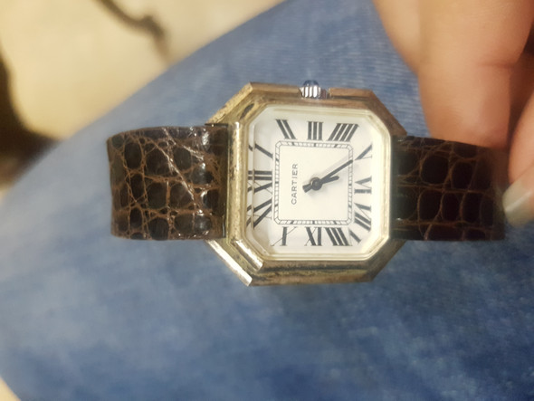 Weiß jemand ob diese Armbanduhr Original ist? Und ob sie was wert ist?