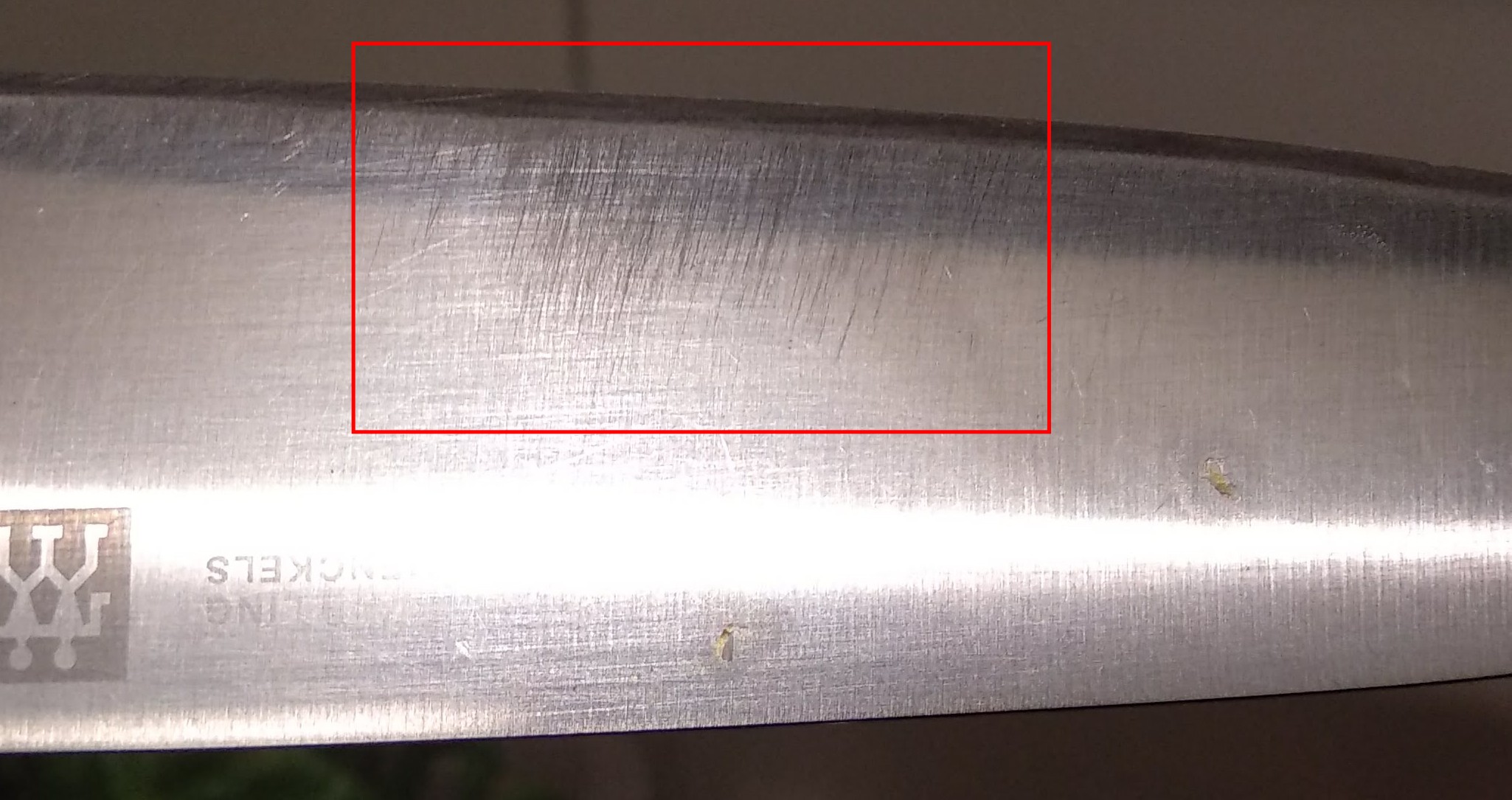 Wie kann ich die Seite eines zerkratzen Küchenmessers glätten? (Messer)