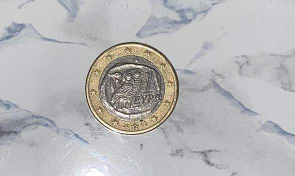 Wie viel ist diese Münze mit Fehlprägung wert?